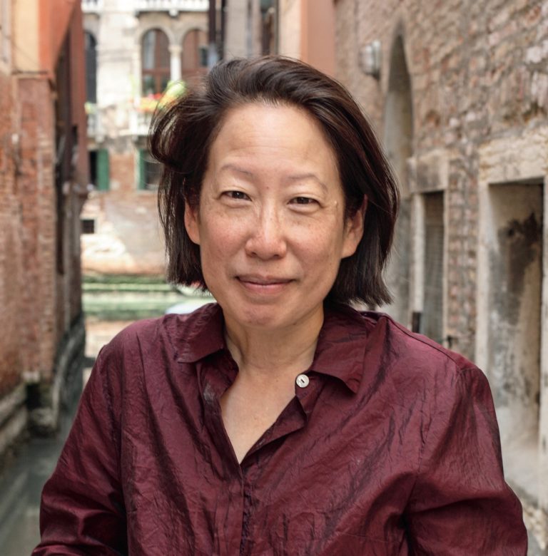 A middle-aged Asian American woman in Venice.